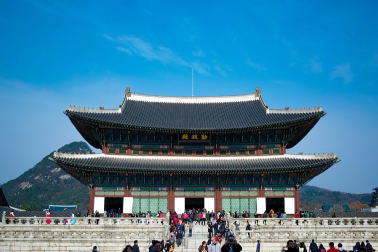 Geunjeongjeon, the throne hall of Gyeongbokgung Palace, on its two-tier stone platform with Bugaksan behind