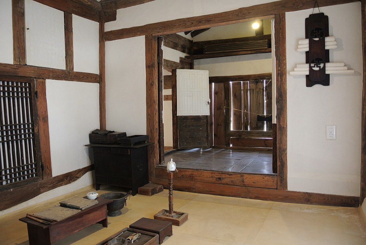 A traditional room displayed at the National Folk Museum of Korea, furnished for living at floor level.