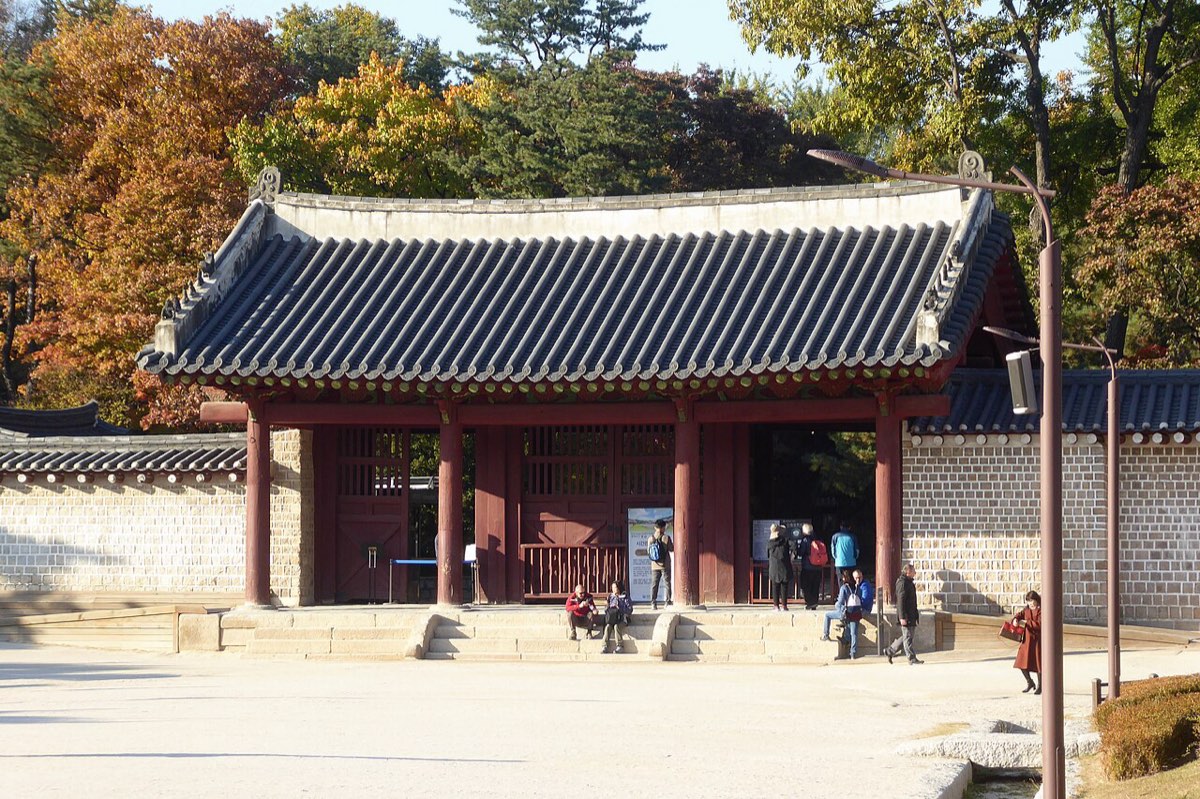 Visitors gather at the entrance gate of Jongmyo Shrine in central Seoul.