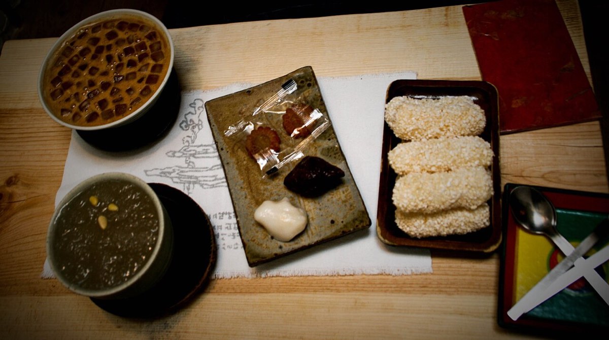Tea served with a plate of rice cakes at a traditional teahouse in South Korea.