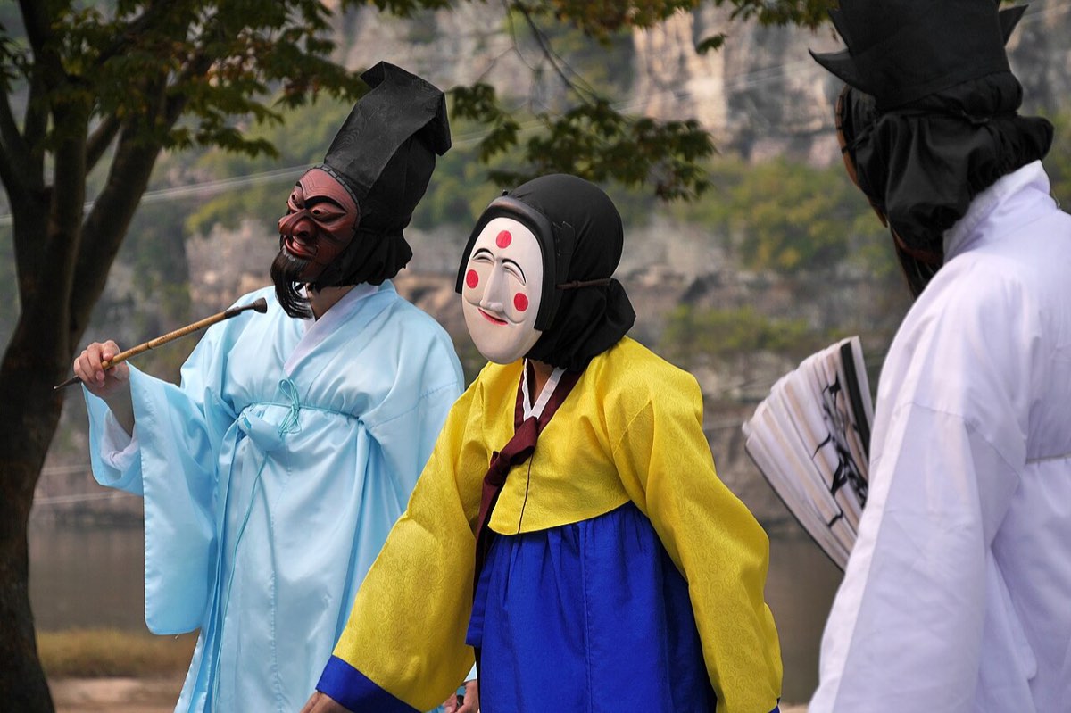 Masked Scholar, Concubine and Aristocrat characters in the Hahoe Byeolsingut talnori mask dance drama in Andong.