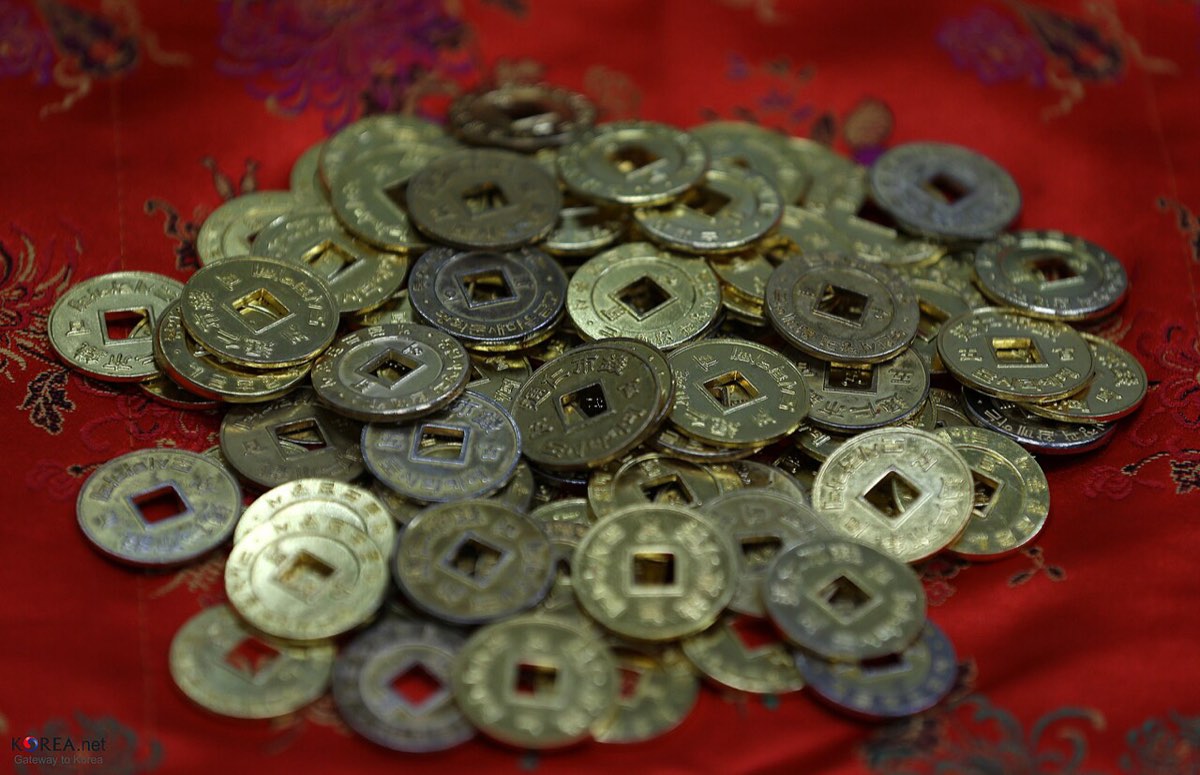 A tray of brass yeopjeon coins at Tongin Market, used to pay for dishes in its coin lunchbox.
